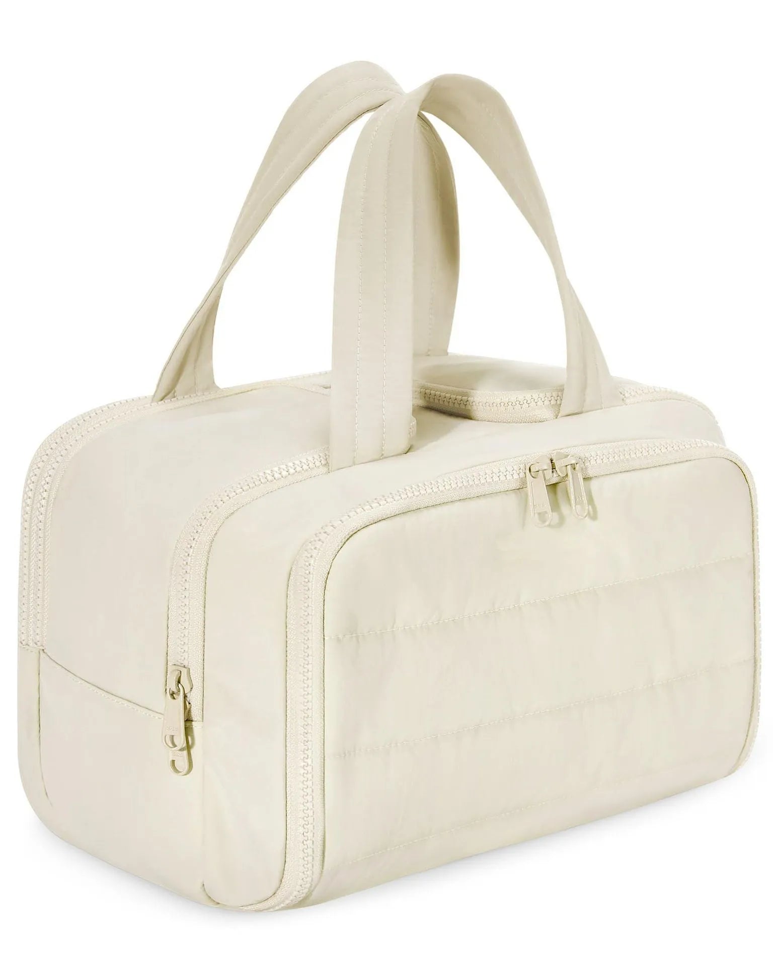 Large lightweight travel wash bag in beige colour with wide-opening design showing interior space