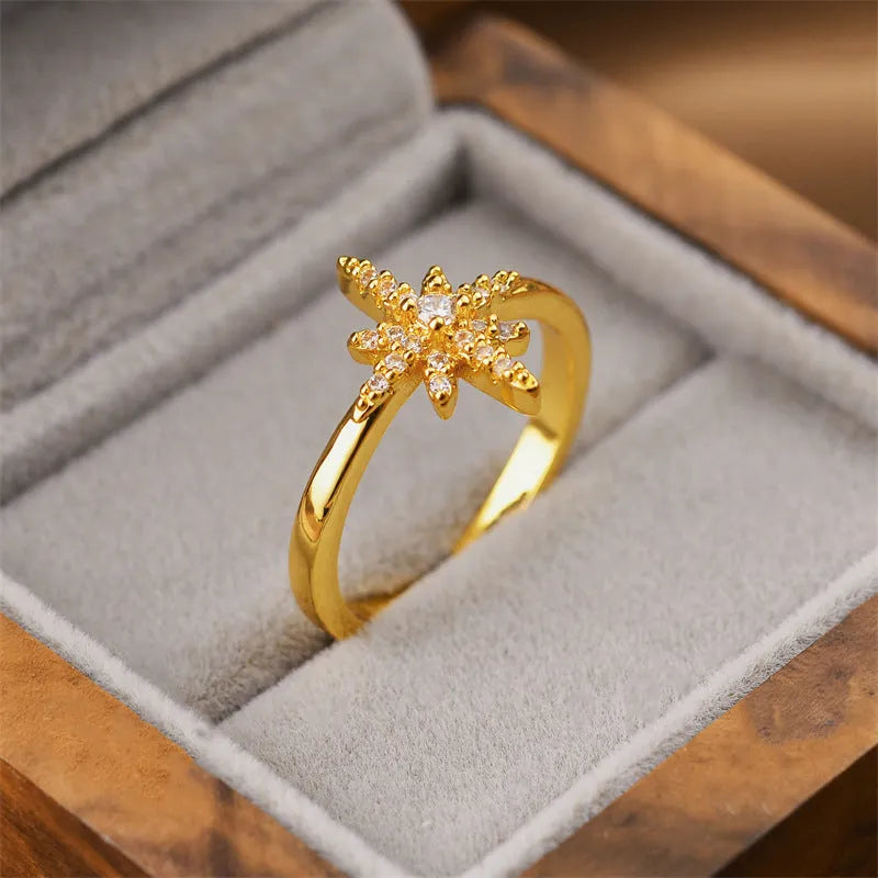 Gold geometric open fashion ring made from electroplated copper, shown in a Korean-inspired style.