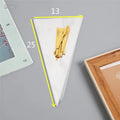 Clear triangle-shaped plastic bag with a twisted metal tie wire closing the top.