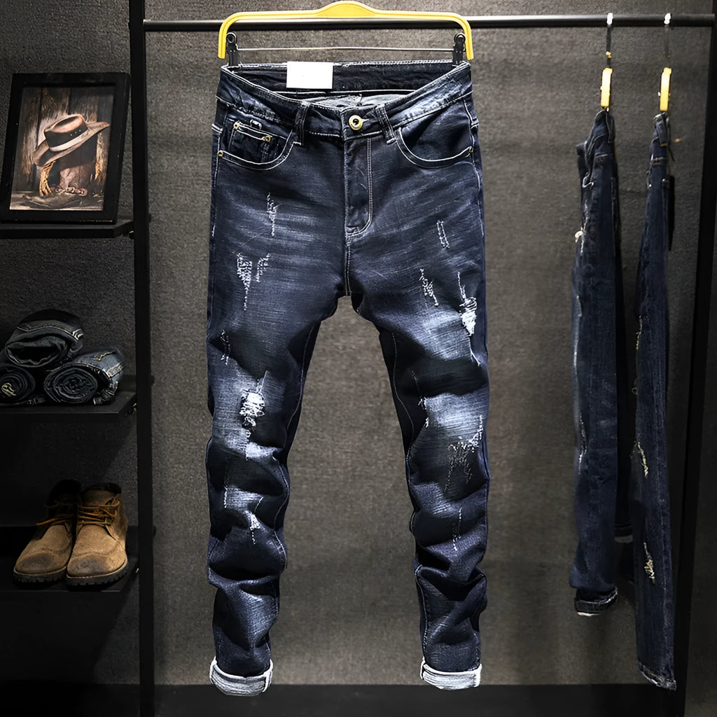 Men's slim-fitting skinny jeans in dark blue cotton denim with micro elasticity.