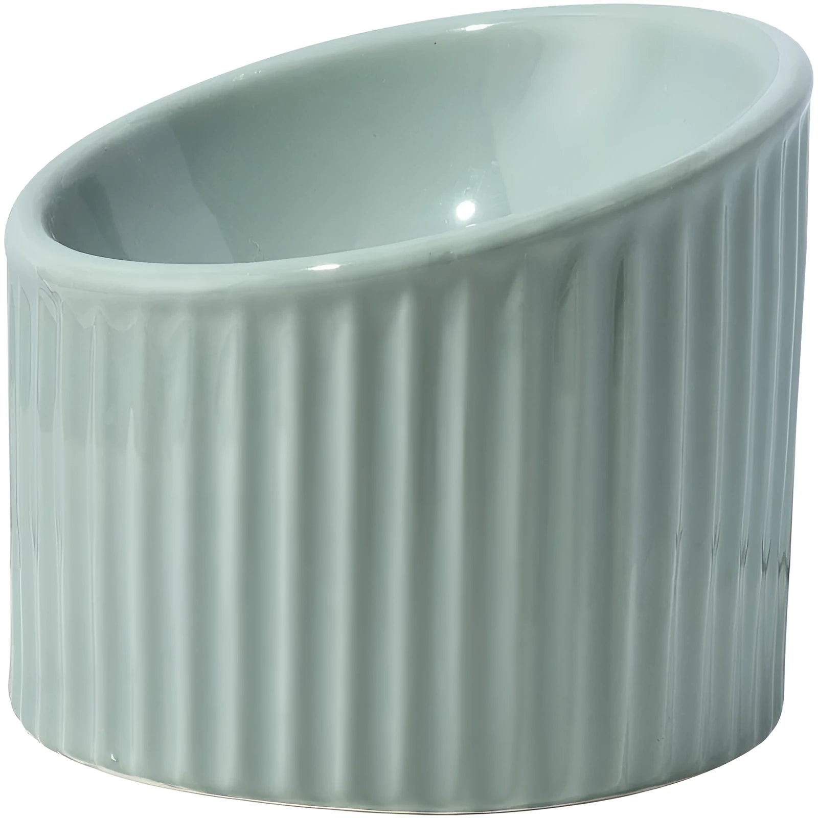 A dark green ceramic elevated cat bowl on a wooden surface, showing its tilted, round shape.