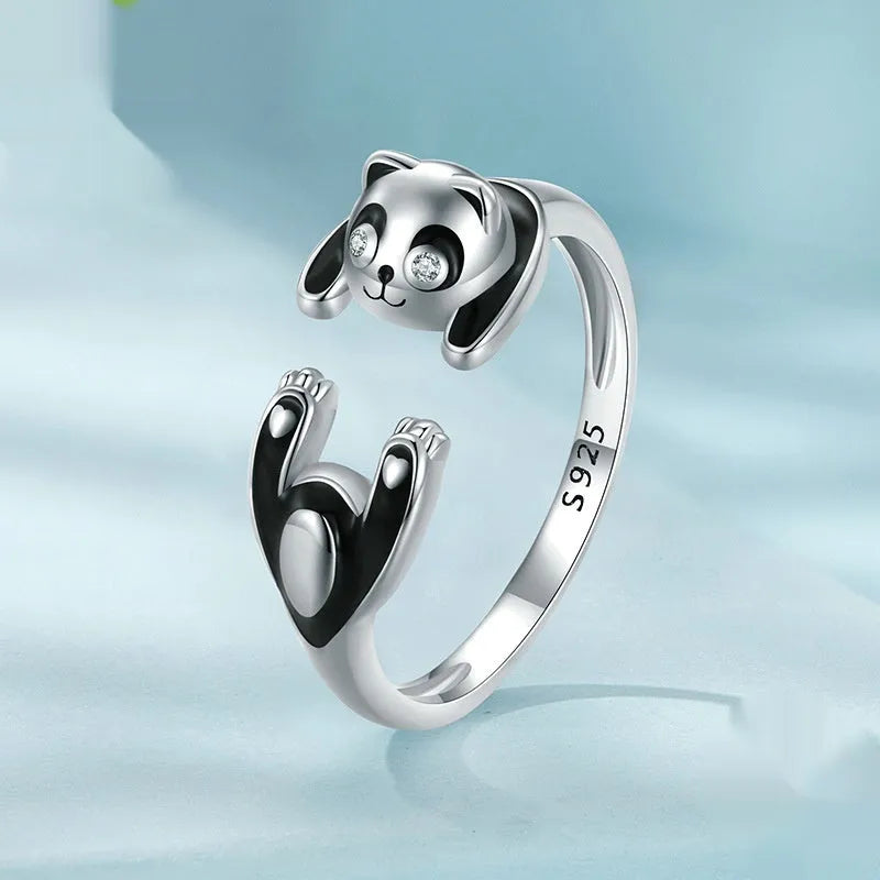 Adjustable sterling silver panda ring bracelet with white gold plating and drip oil finish.