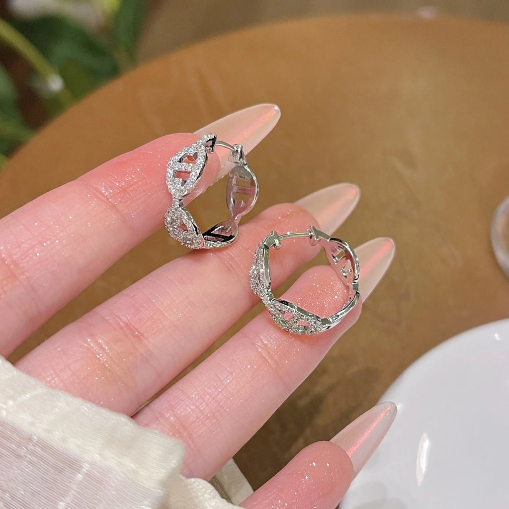 Ladies casual earrings with diamond-effect design in silver, gold, or rose gold metallic finishes