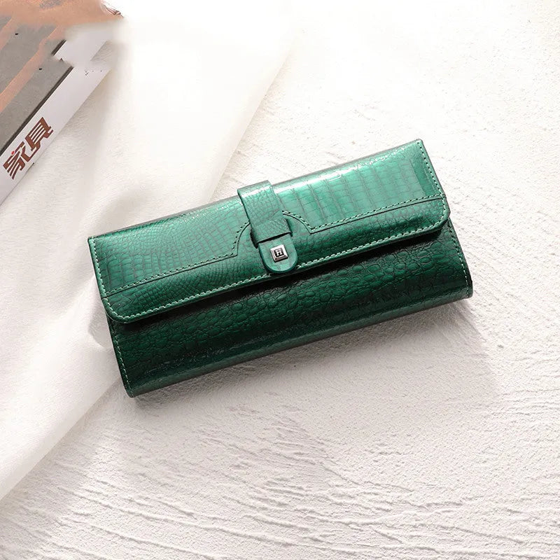 Women's genuine leather compact wallet in solid colour, size 19x10x3cm, available in wine red, black, peacock blue, brown