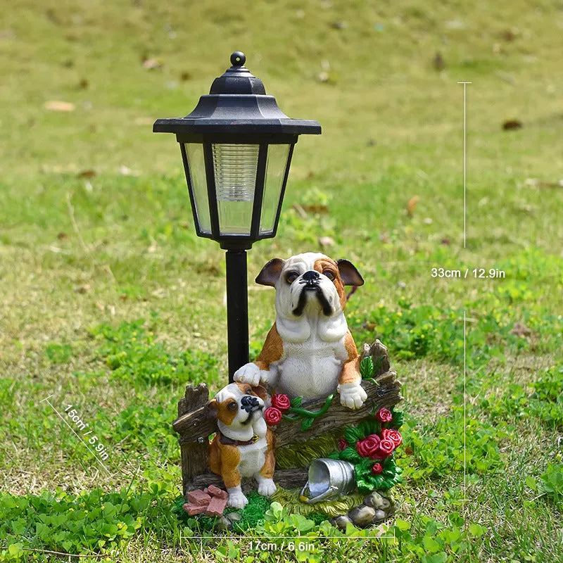Solar hexagonal garden lamp with decorative resin figurine on plastic base for outdoor pathway lighting