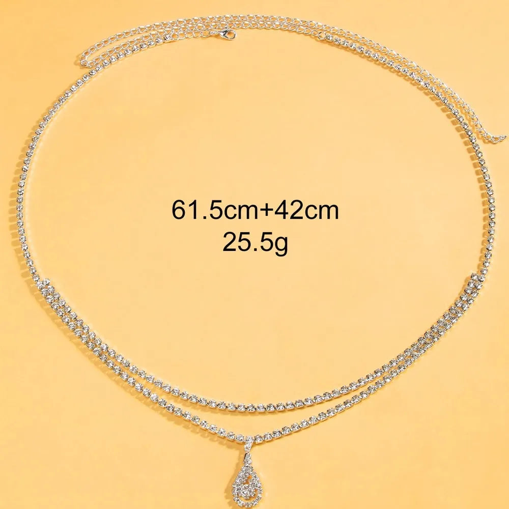 Gold or silver water drop pendant waist chain for women with rhinestone and tassel accents, lobster clasp