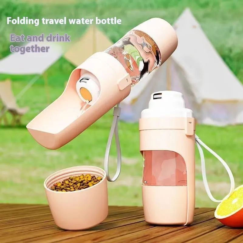 Green 2-in-1 travel dog water bottle and feeder with lanyard, showing folded size.