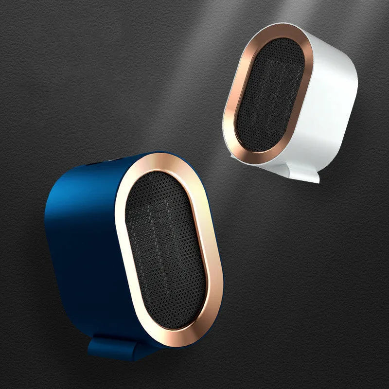 Desktop electric heater with cast metal housing and rotating air outlet in various colour options