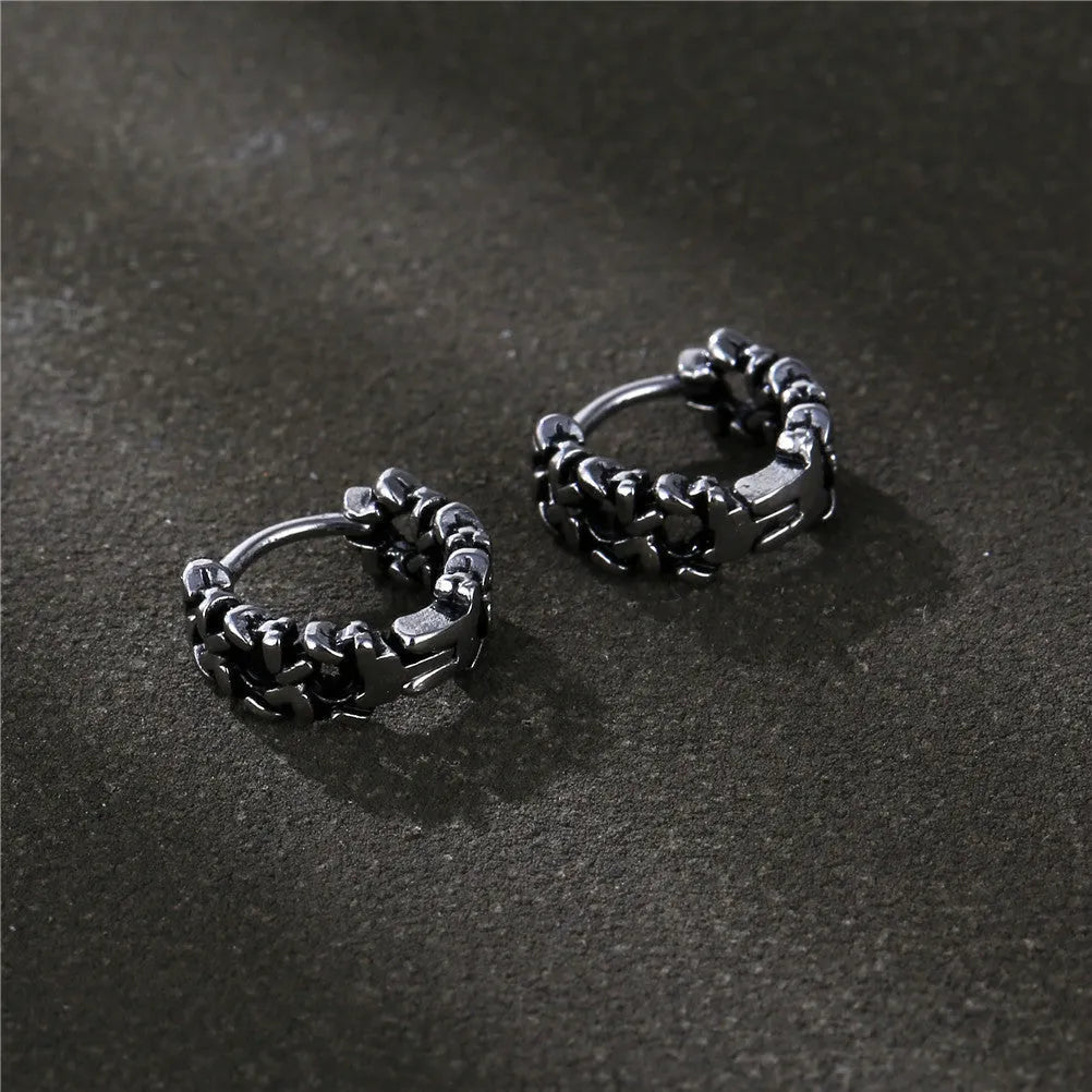 Men's geometric copper earrings in silver, shown in 10mm and 14mm sizes on a plain background.