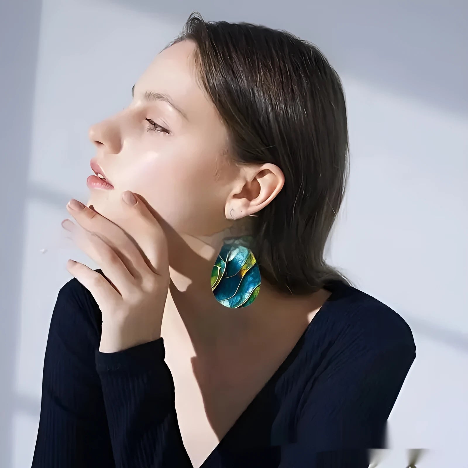 Printed acrylic flat branch knot earrings in drop shape design shown front view