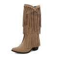 Women's suede knee-high boots with tassels, a square toe, and a chunky waterproof platform sole.