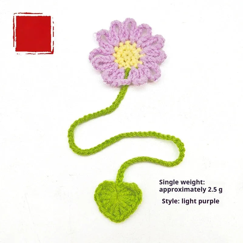 Hand-crocheted wool bookmark with daisy design on flexible wire in multiple colour options