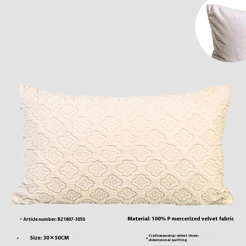 Brown gold antique style three-dimensional quilted cushion pillow on a sofa.