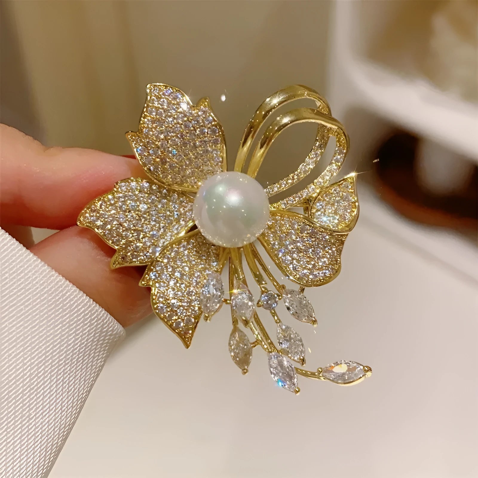 Alloy brooch in natural flower shape with electroplated finish, featuring adjustable and anti-exposure pin closure for women's coats and suits.