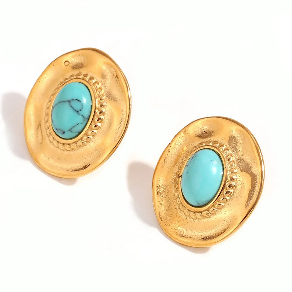 Stainless steel retro geometric oval stud earrings with electroplated finish on white background