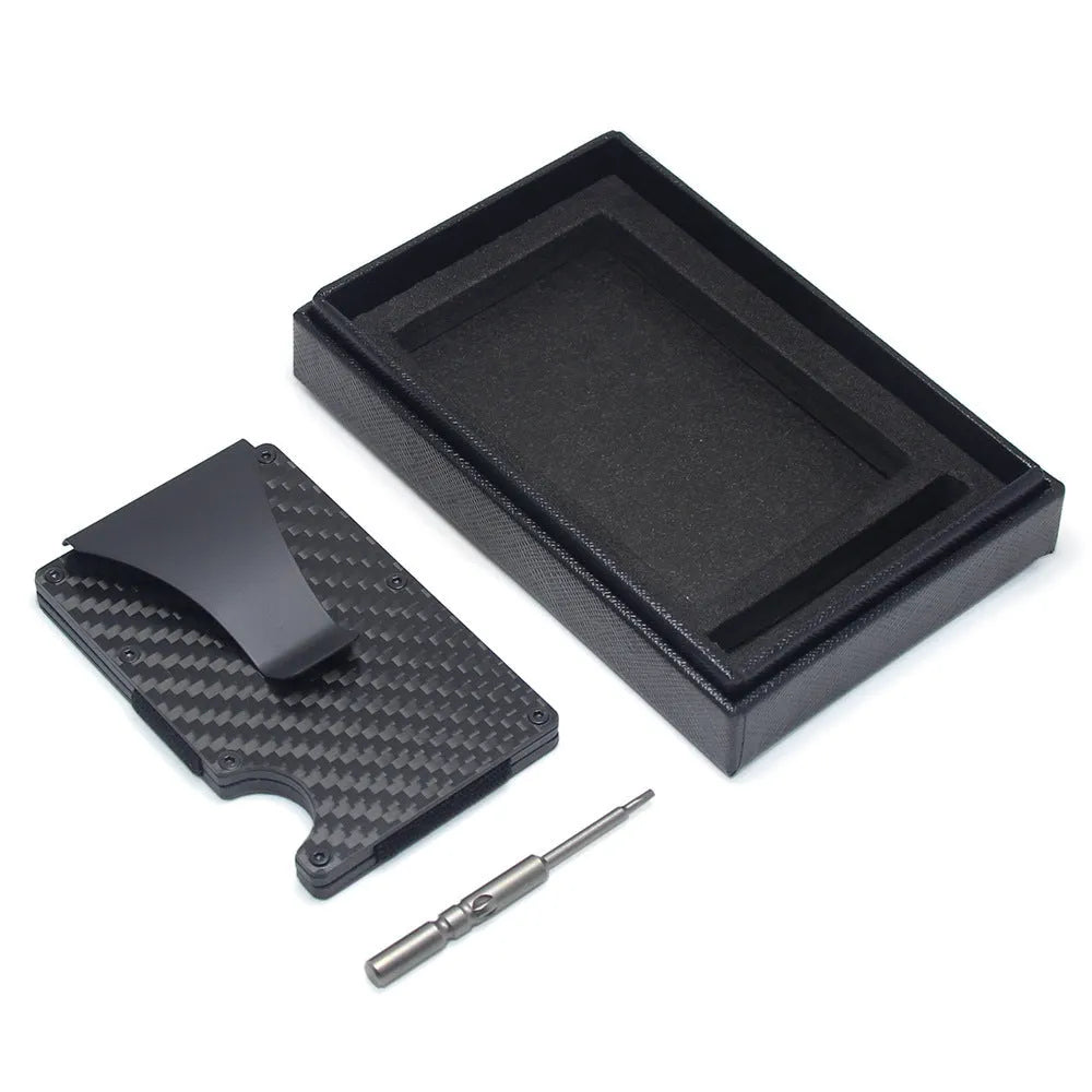 Geometric aluminium and carbon fibre card wallet for business cards and banknotes in a gift box.