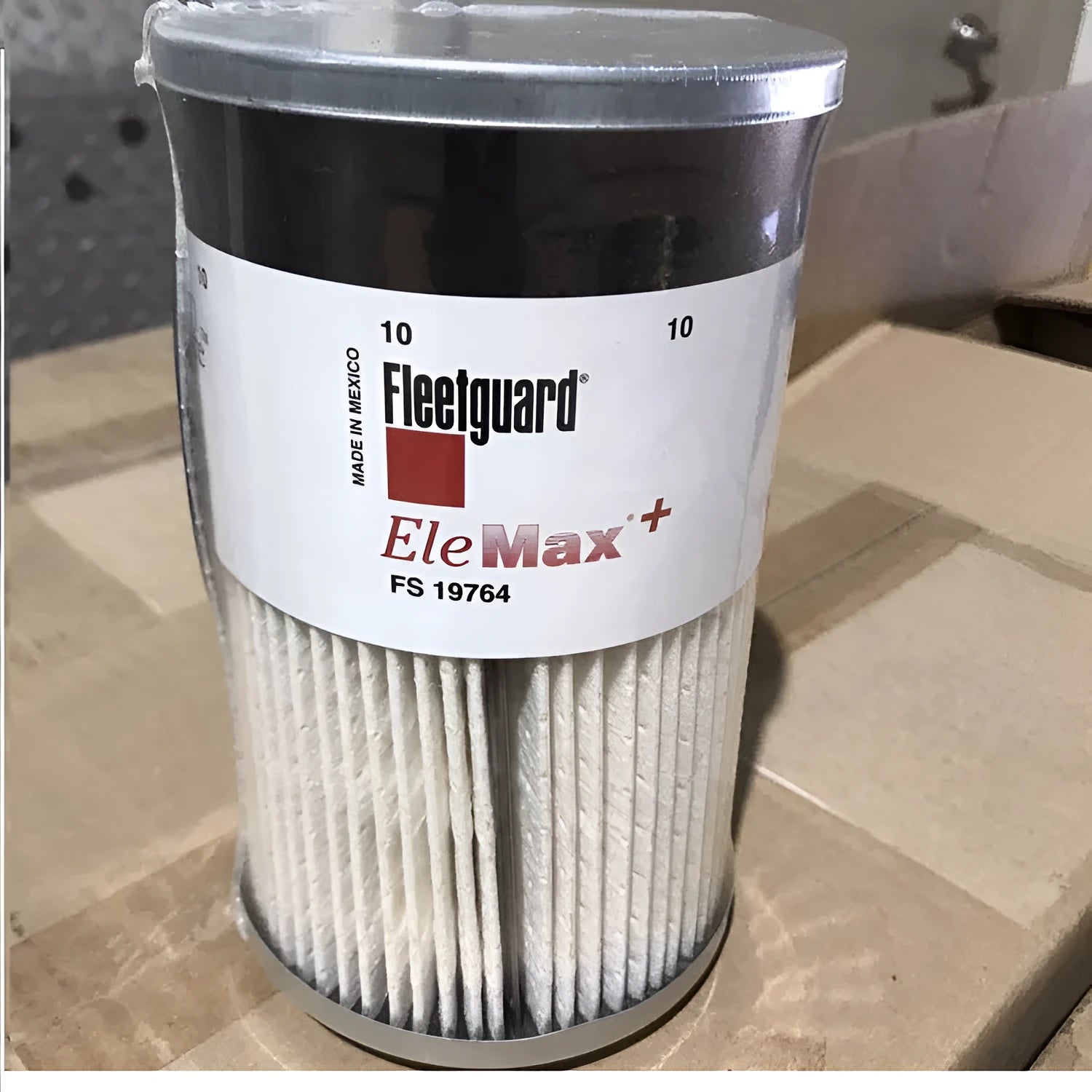 FS19764 diesel fuel filter with white housing and specifications for generator use.