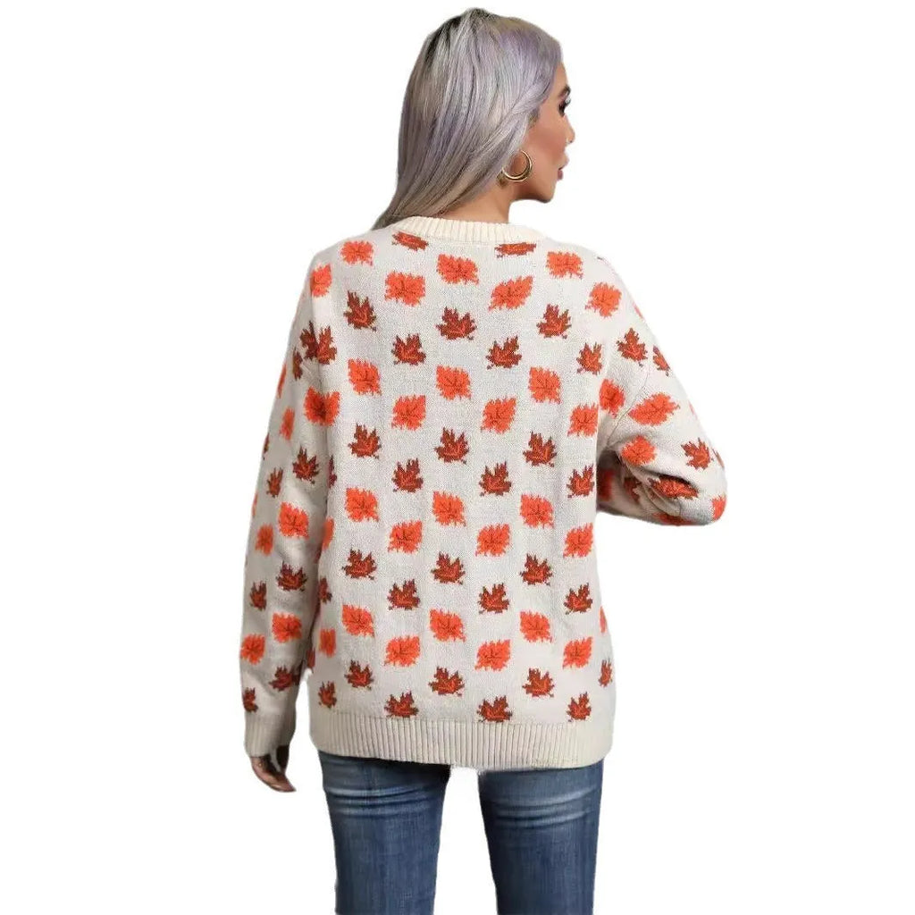 Beige maple leaf round neck contrast colour loose fit polyester pullover sweater on model