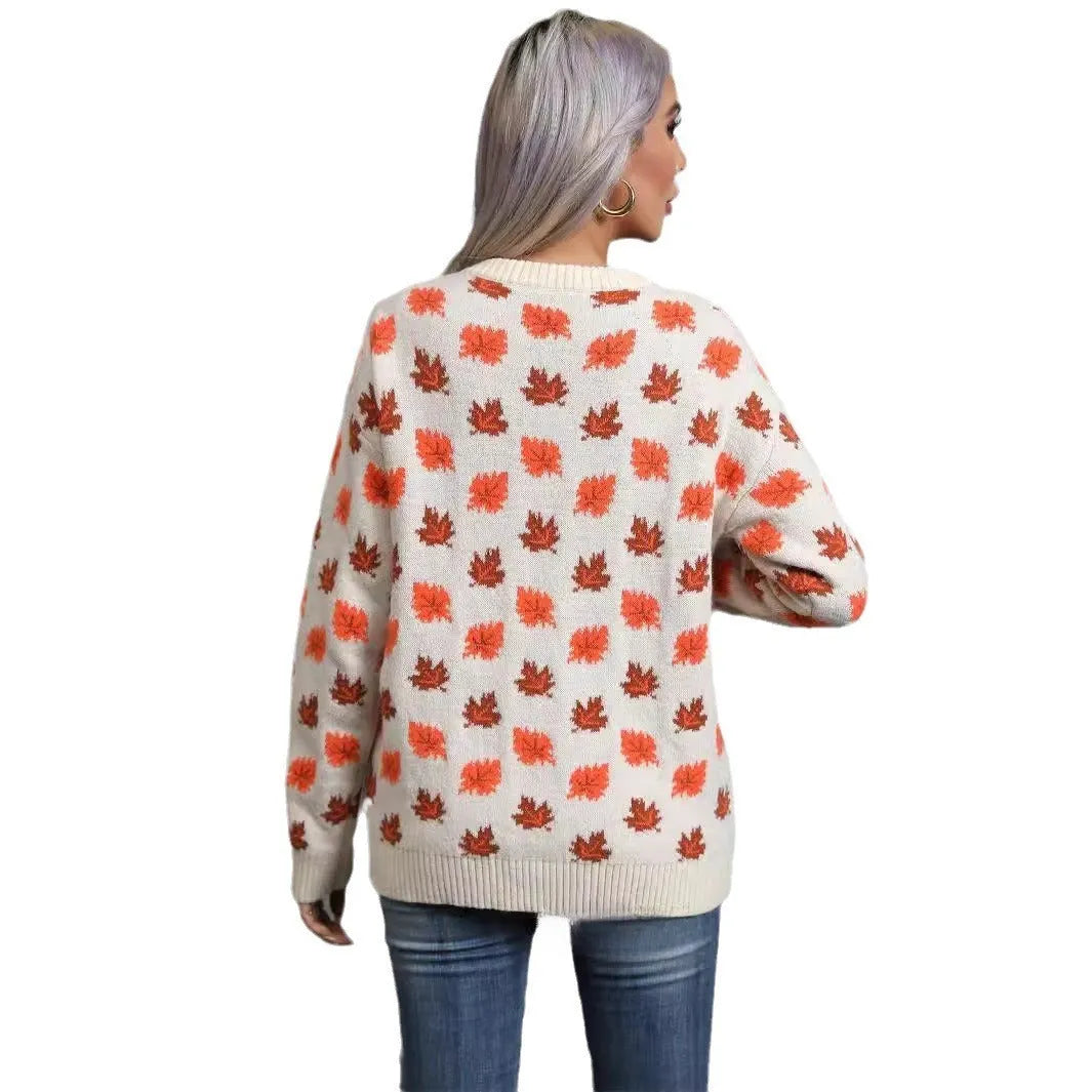 Beige maple leaf round neck contrast colour loose fit polyester pullover sweater on model