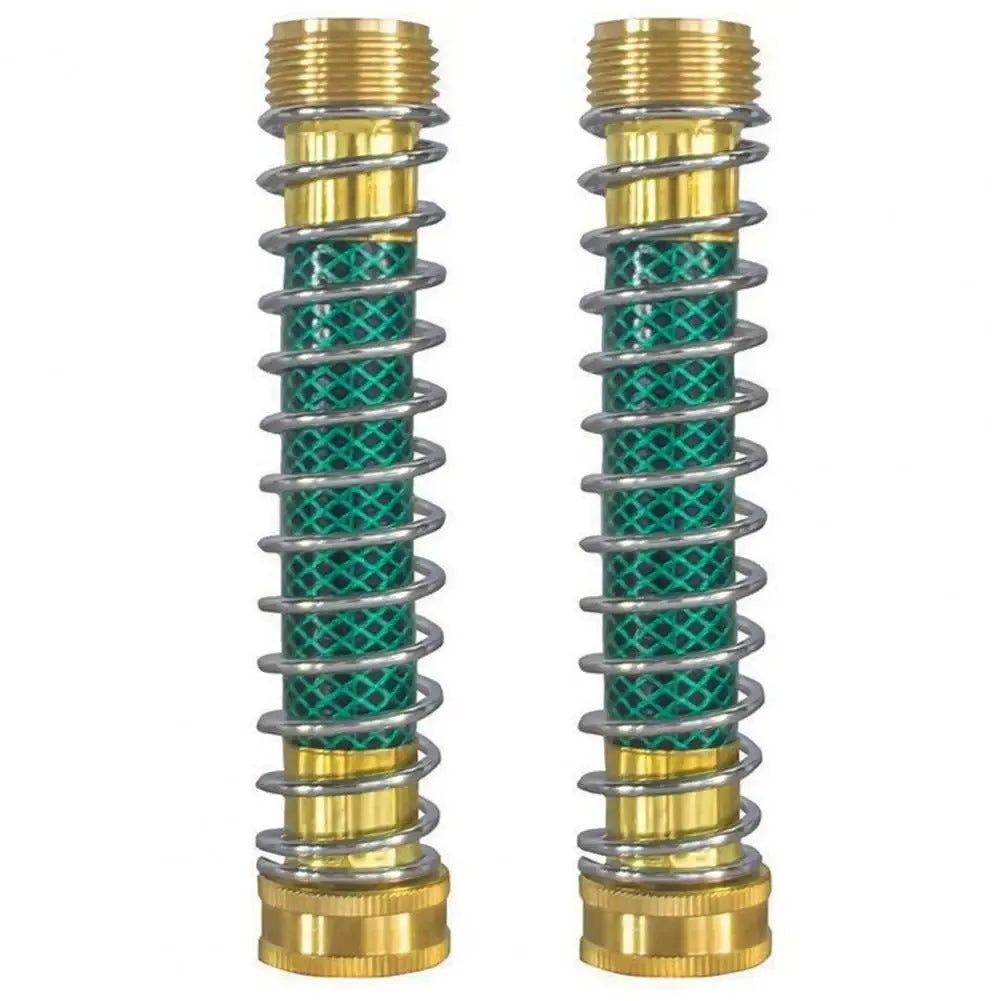 Close-up of a 15cm long brass garden hose spring connector with a visible internal spiral to prevent kinking.