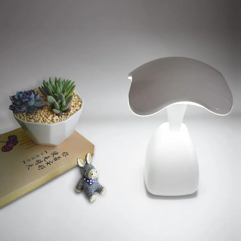 White modern minimalist LED desk lamp with touch controls and built-in battery