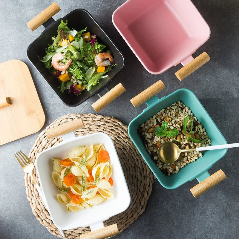 Porcelain ceramic bowl with lid in irregular shape design, shown in available colour options.