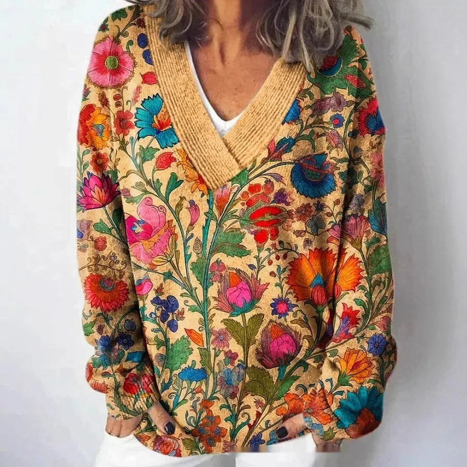 White women's V-neck long sleeve sweatshirt with a detailed 3D floral pattern print.