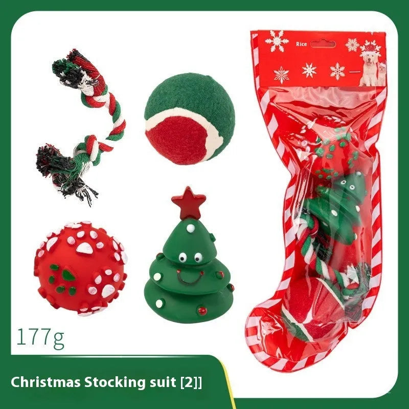 Christmas vinyl dog toy set with Santa Claus heads, trees, tennis balls, and bite ropes
