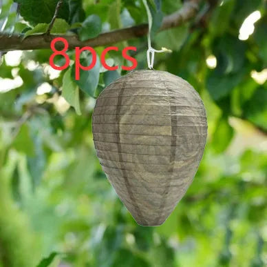 White paper beehive-shaped lantern with hexagonal facets, shown next to a ruler indicating 22cm width.