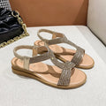 Women's patent leather beach sandals with rhinestone decoration in gold, silver, or black colours