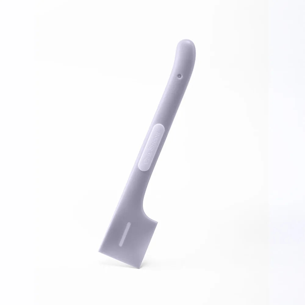 Long green TPR pet food spoon with right-angle head for feeding from tins