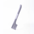 Long green TPR pet food spoon with right-angle head for feeding from tins