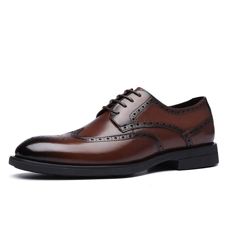 Men's black brogue leather shoes in a business style on a white background.