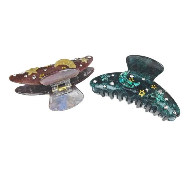 Oversized hair barrette with starry sky pattern in cellulose acetate showing colour options