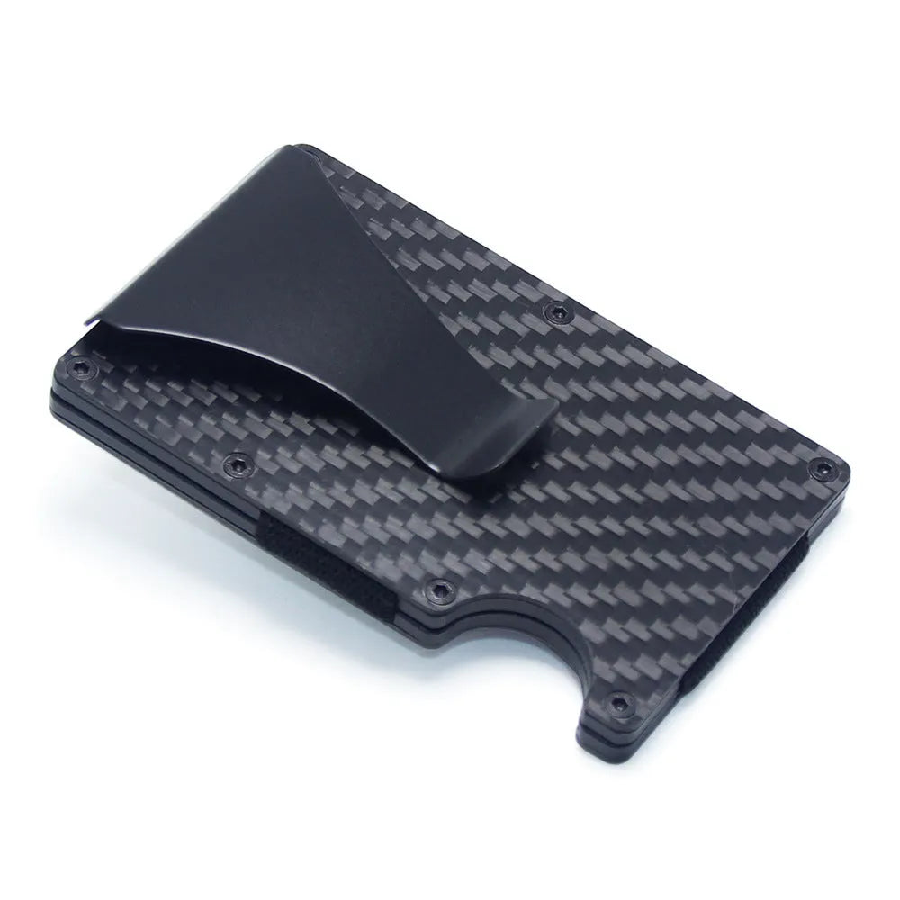 Geometric aluminium and carbon fibre card wallet for business cards and banknotes in a gift box.