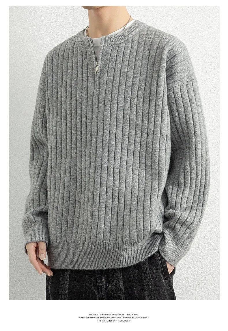 Gray men's loose half-zip textured knit sweater on a hanger.