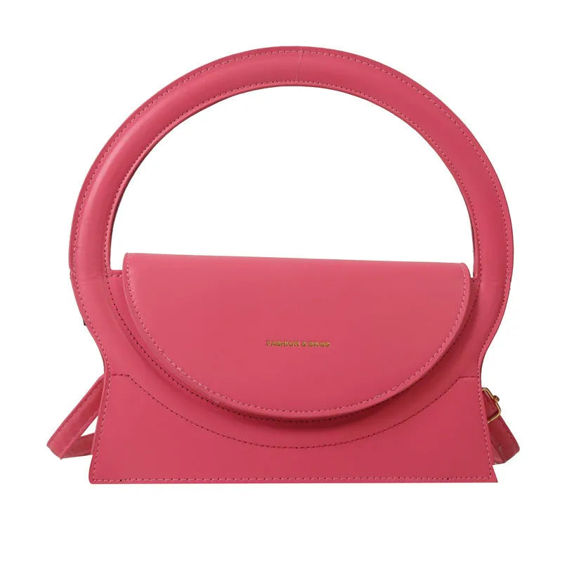 PU leather messenger bag in horizontal square shape with sandwich pockets and stitching details