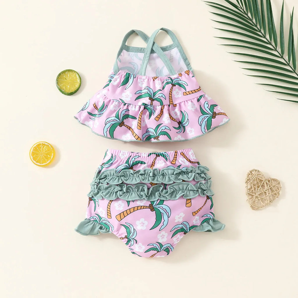 White children's two-piece swimsuit set with top and beach shorts on hanger