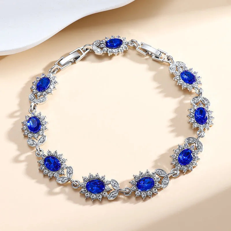 Women's zircon bracelet with electroplated finish in environmentally friendly alloy showing colour options