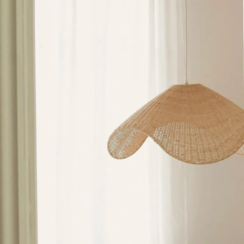 Handmade natural bamboo rattan chandelier with woven willow shade and warm LED light.