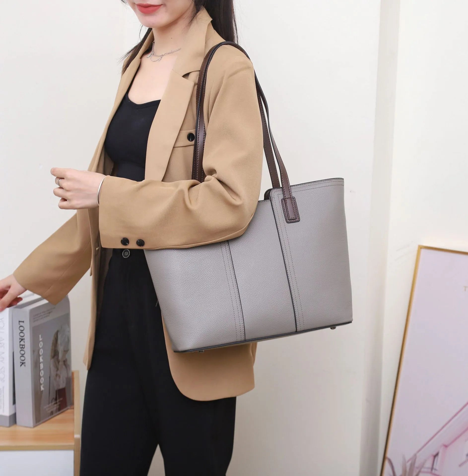 Women's genuine leather commuter shoulder bag in khaki colour with sandwich pocket and internal organisation