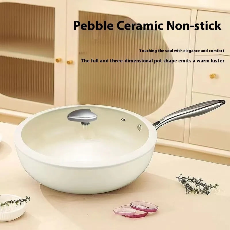 28cm pebble ceramic non-stick stir fry pan with refined iron body and stainless steel glass lid on a kitchen counter
