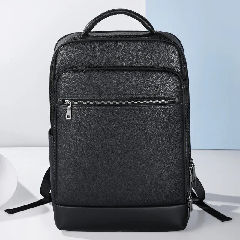 Black leather men's business computer backpack with curved shoulder straps and professional styling