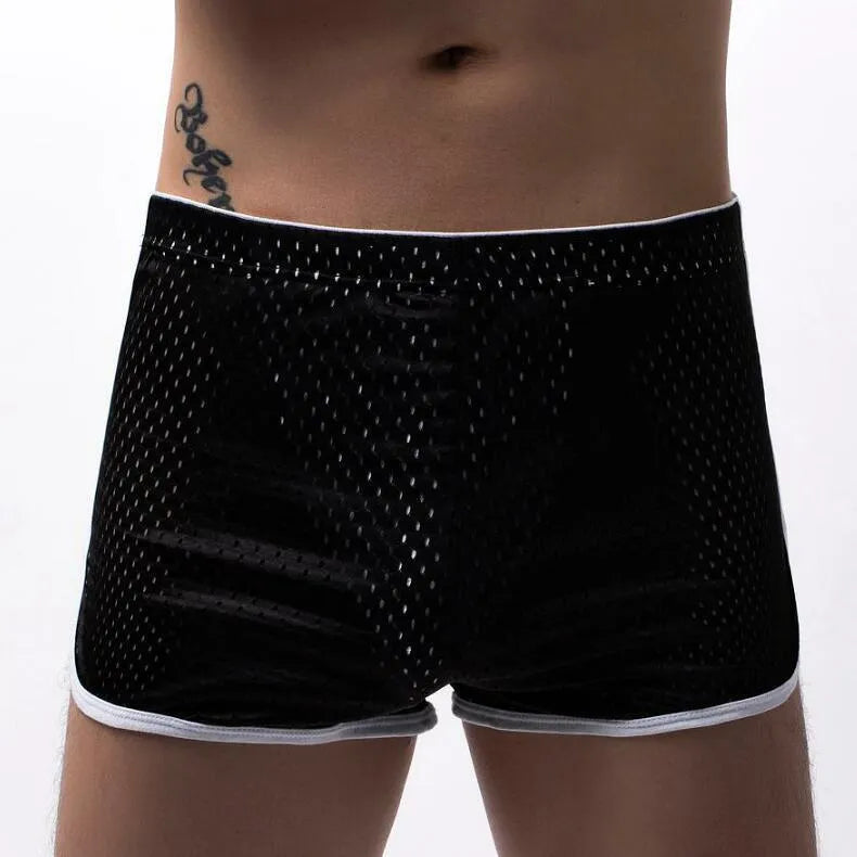 Men's cotton boxer shorts in multiple colours on a mid-waist fit model