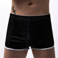 Men's cotton boxer shorts in multiple colours on a mid-waist fit model