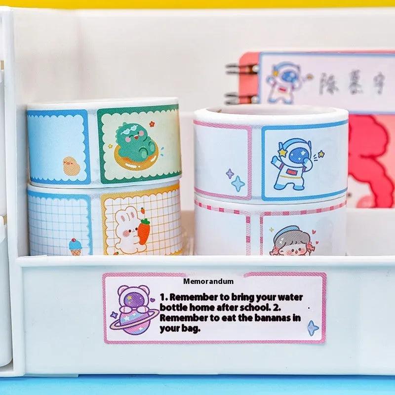 Roll of colourful cartoon name tape stickers showing Dinosaur, Astronaut, Rabbit, and Girl design options.