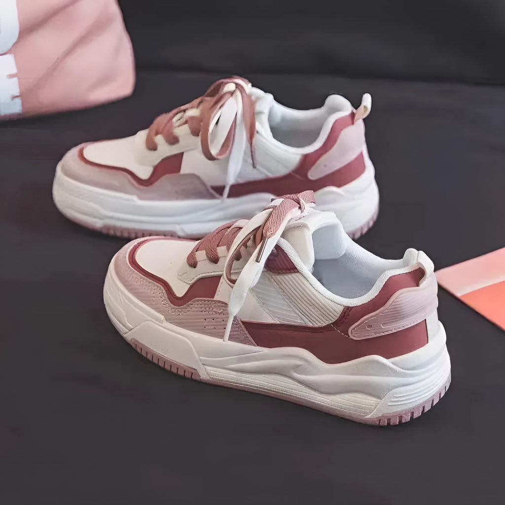 Women's beige and pink low-top rubber sneakers with height-increasing sole on a white background