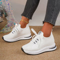 Plus size women's lace up mesh platform flat pumps in black with round toe and rubber sole