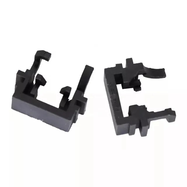 Black plastic LED headlight adapter for Ford vehicles measuring 30.7x10x26mm