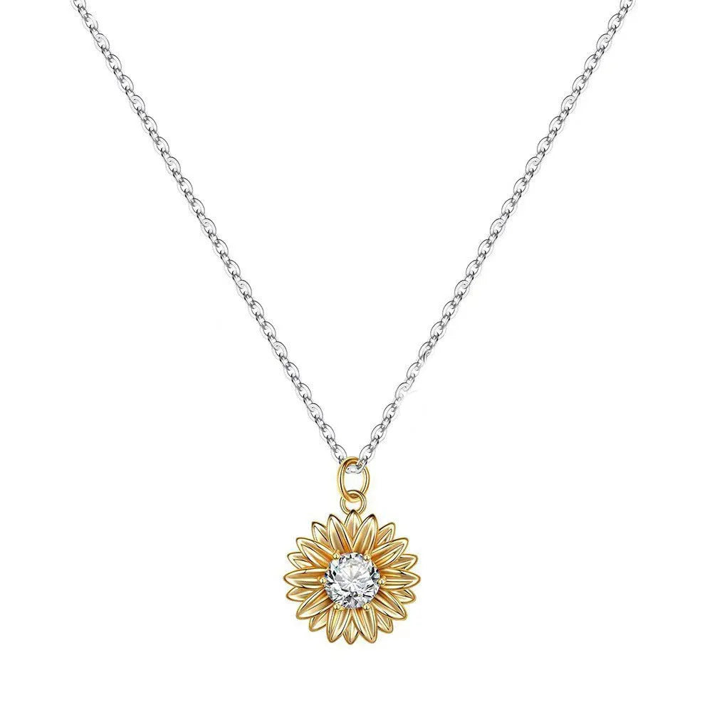 Women's 925 sterling silver sunflower necklace with daisy petal pendant on an adjustable cross chain.